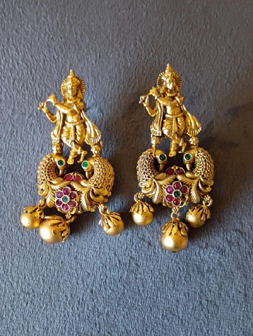 Gold-Tone Krishna & Peacock Dangle Earrings with Red and Green Accents